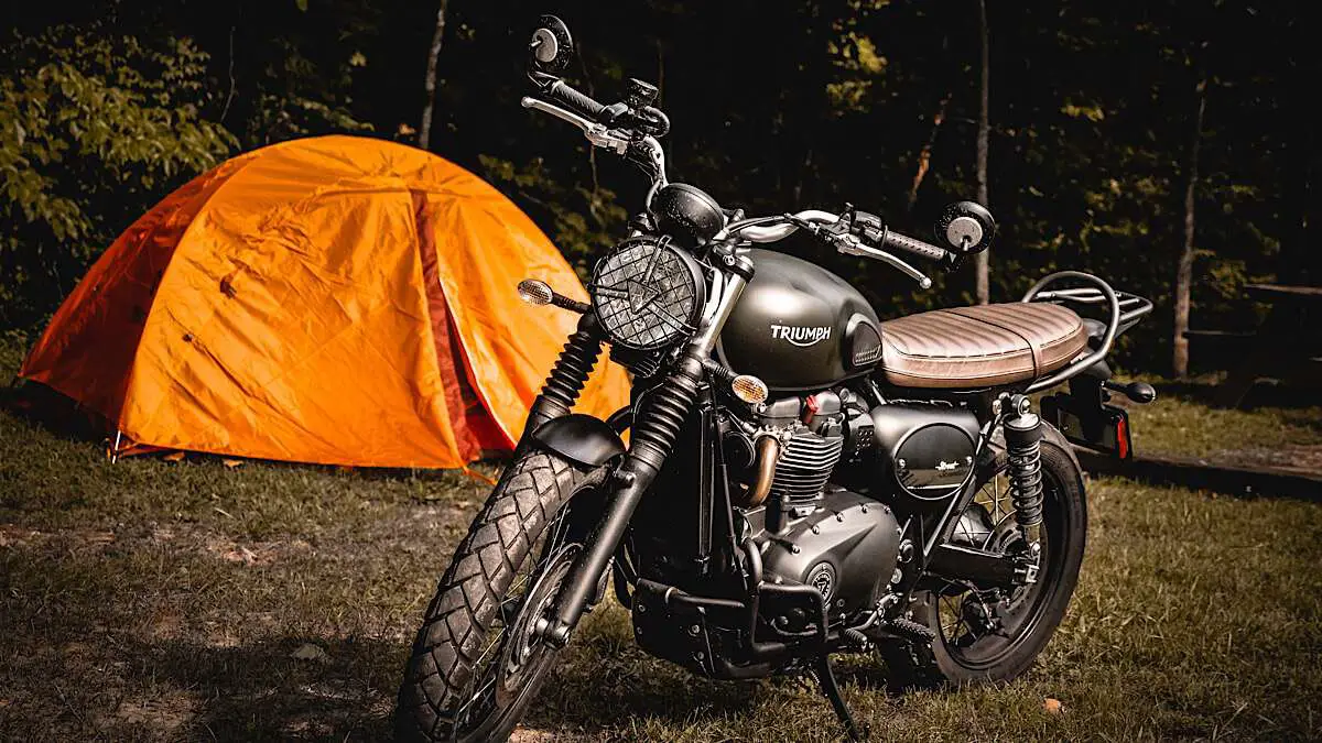 Motorcycle in front of a tent