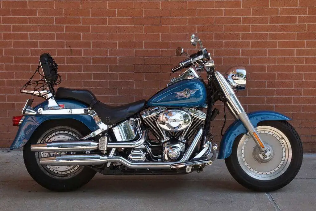 Blue motorcycle with a backrest