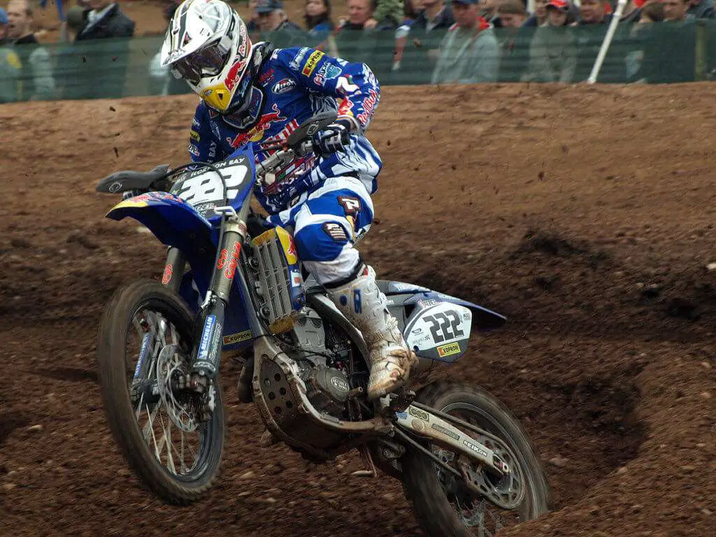 A motocross rider wearing a sports neck brace