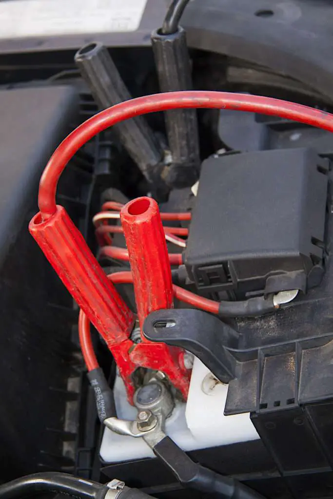 Battery with jumper cables connected