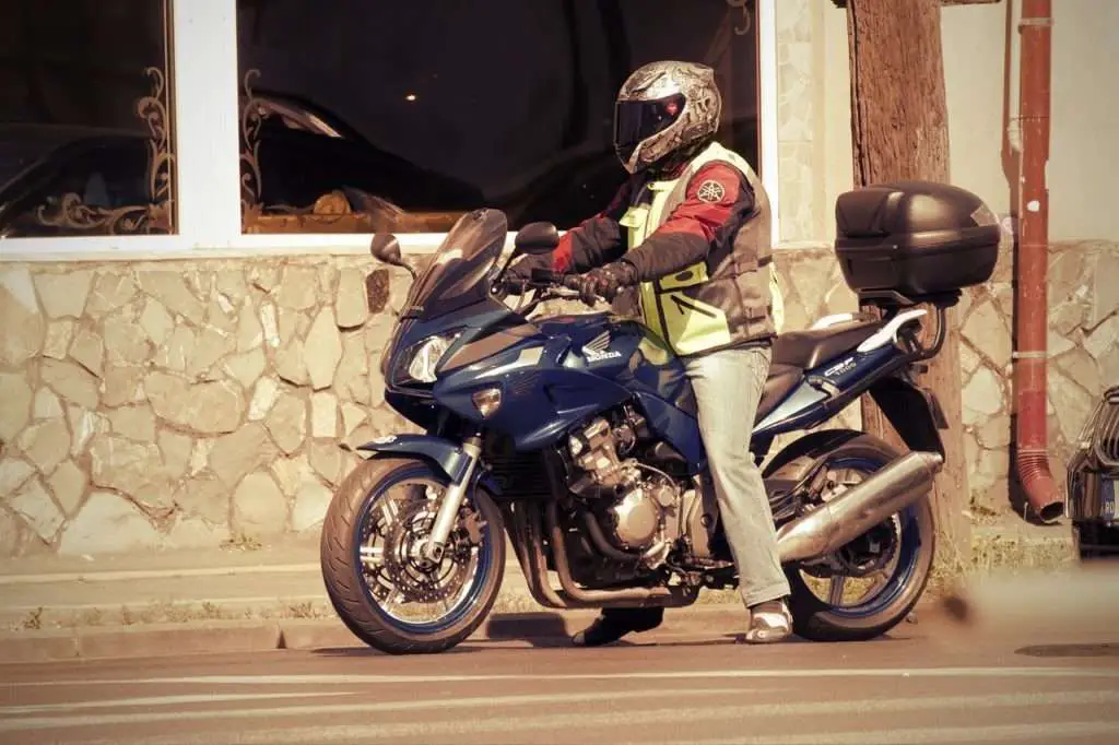 Motorcycle rider wearing full equipment