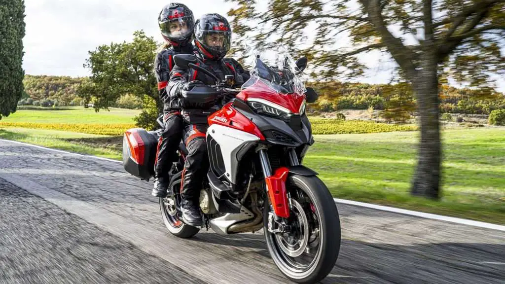 2 people riding the motorcycle