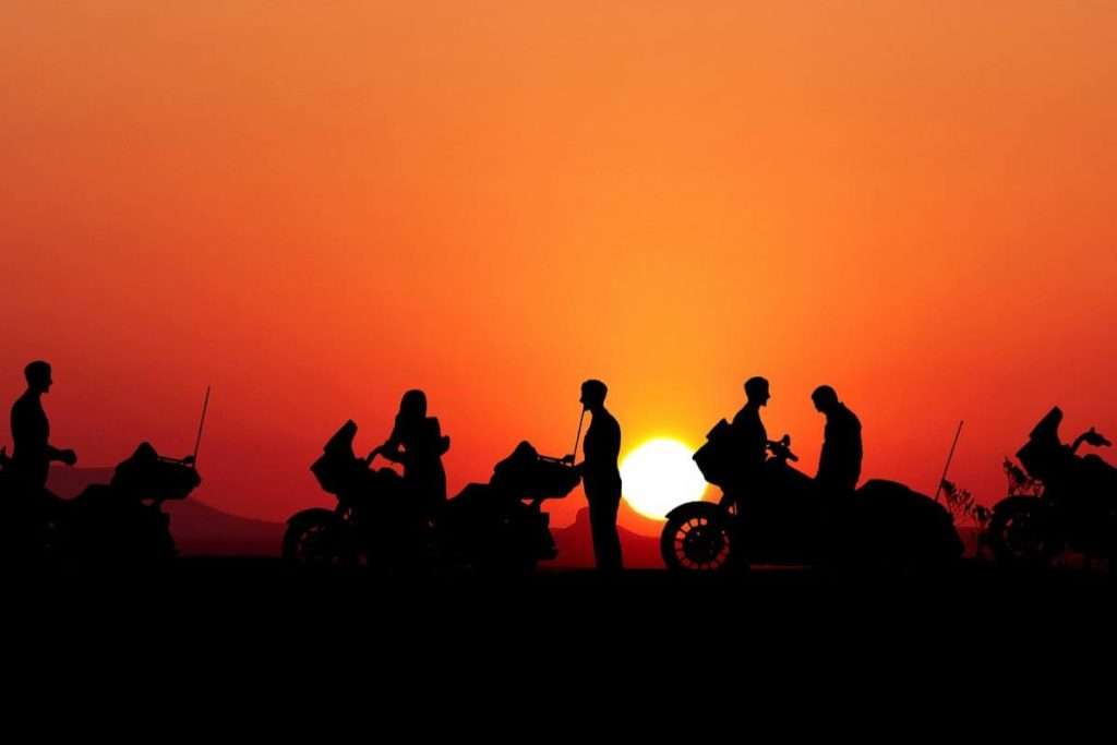 Motorcycle riders at sunset