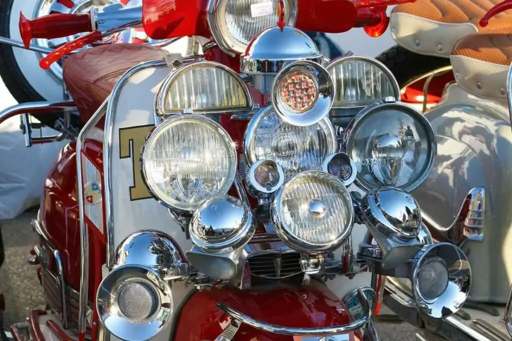 A scooter with a lot of lights on