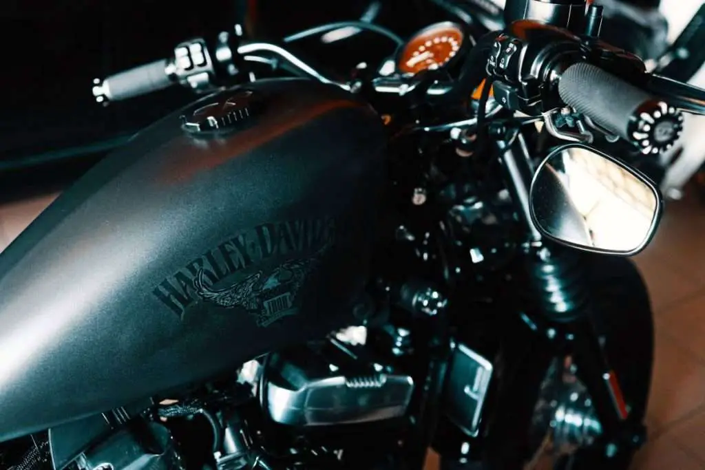Black Harley Davidson motorcycle with focus on the handlebars